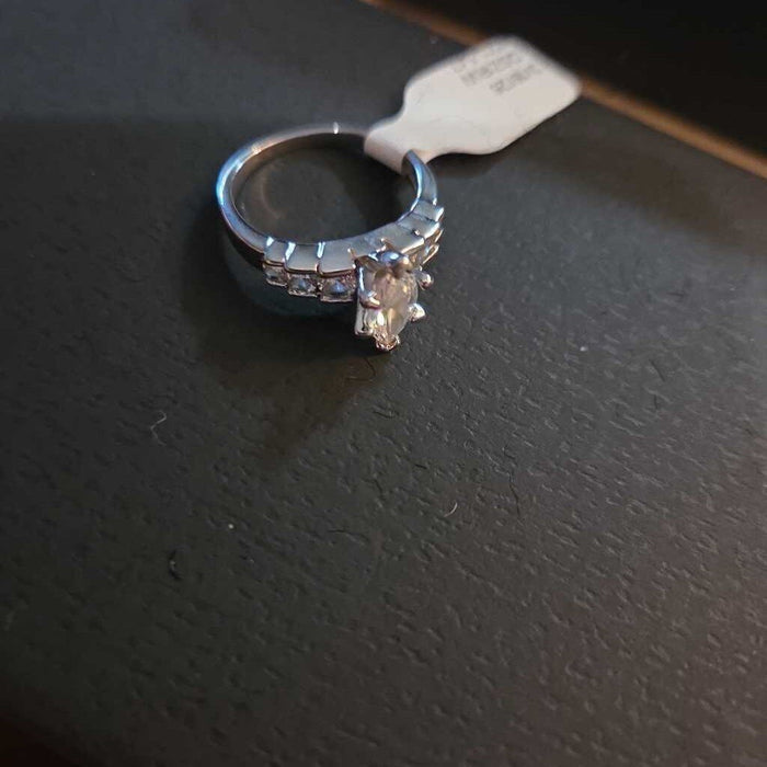Marquise Cut Engagement Ring with Side Stones