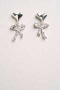 MINERA ATELIER Boucles d'Oreilles Petit Coeur Enrubannés