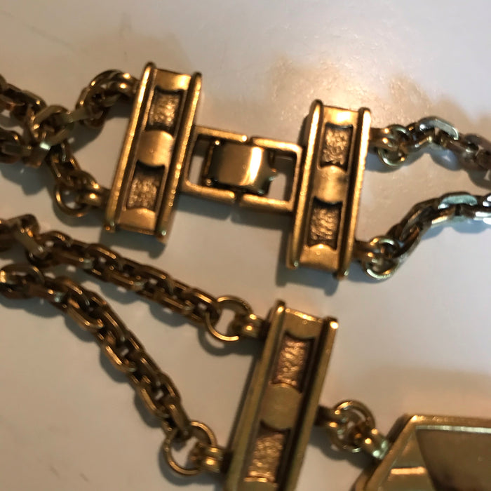 Striking Gold Tone Metal Double Chain Long Necklace with Abstract Side Links circa 1980s