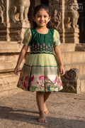 The Nesavu Silk Frock Toddler Girl Silk Frock for Birthdays and Ethnic Celebrations Nesavu 16 (1Y) / Green / Silk Blend SF1125A-16 Nesavu toddler silk frock with zari border and embroidery for birthdays and festive occasions