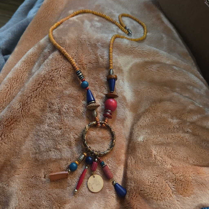 Vintage Bohemian Beaded Necklace with Wooden and Metal Accents